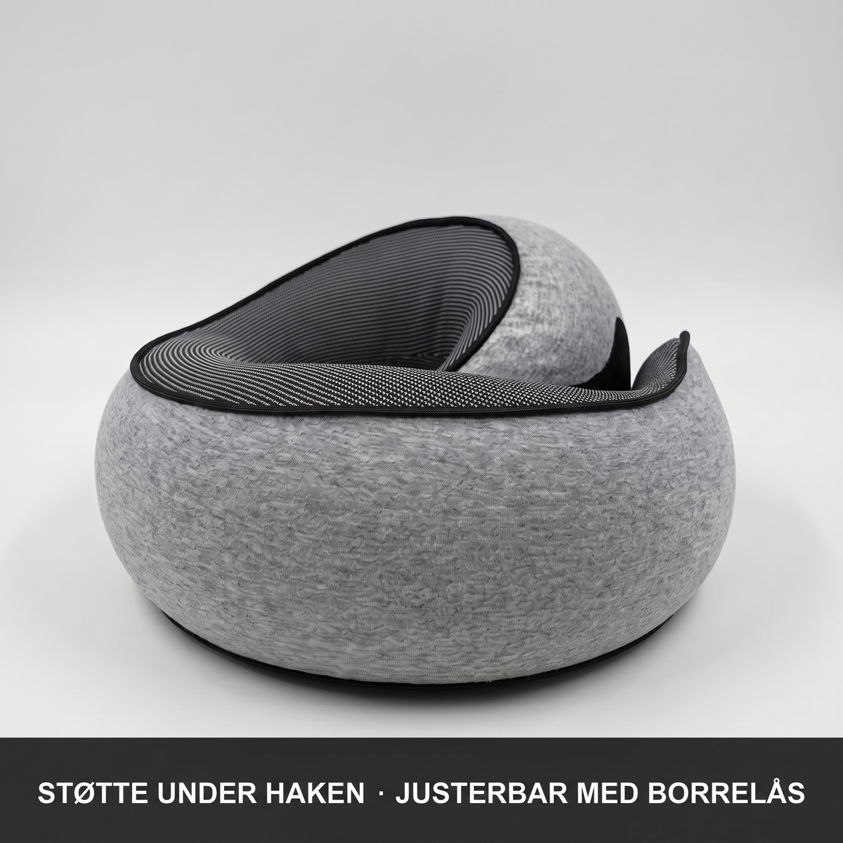 Nærbilde: støtte under haken og justerbar med borrelås